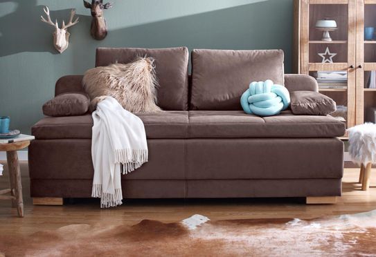 Einfacher Umbau vom Sofa zum Boxspring- und Dauerschläfersofa mit großem Stauraum für das Bettzeug