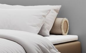 Komfortabler Schlaf: Gepolstertes Bett mit Topper